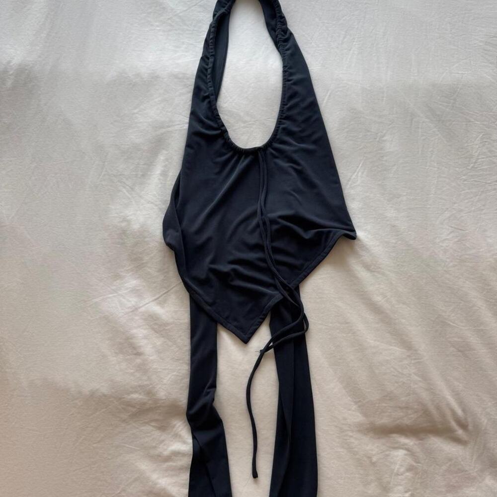With jean halter neck top  with tie detail in navy